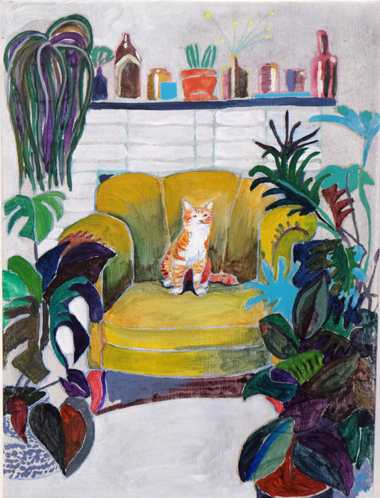 32 Ginger cat in a yellow chair